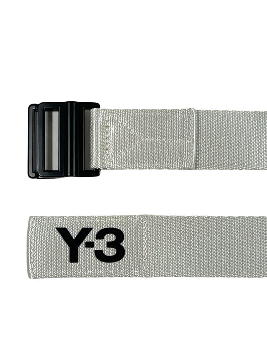 A white polyester ADIDAS x Y-3 H63102 CL L BELT TALC L with a metal buckle and the Y-3 logo on it.