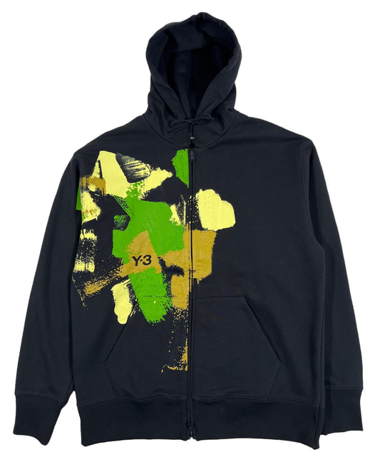 A black ADIDAS x Y-3 hoodie with a yellow and green painting on it.