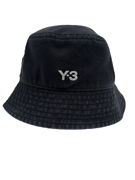 An urban flair black Y-3 IX7000 Y-3 bucket hat with the ADIDAS x Y-3 logo on it.