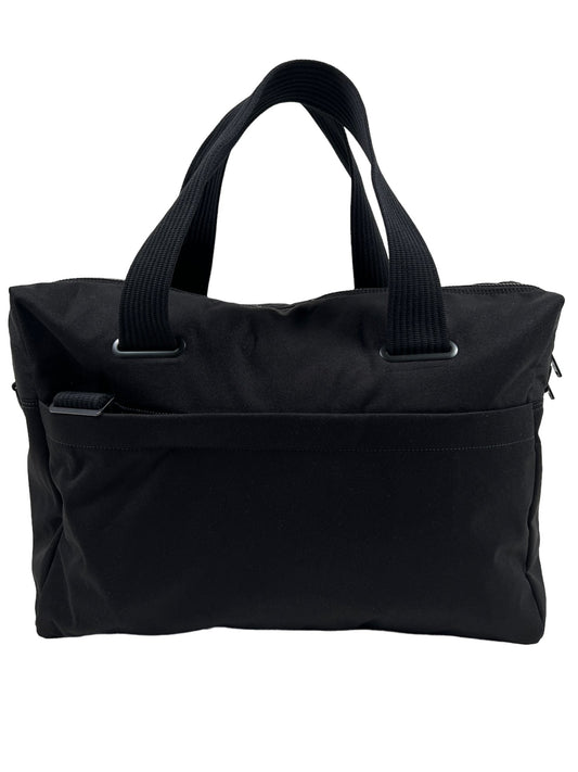 A ADIDAS x Y-3 TRAVEL BAG IR5793 Y-3 HOLDALL BLACK tote travel bag with an adjustable carry strap on a white background.