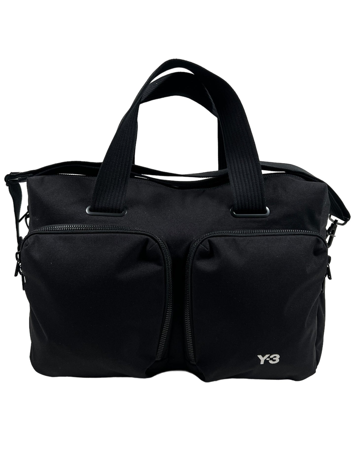 A black ADIDAS x Y-3 TRAVEL BAG IR5793 duffel bag with two compartments and an adjustable carry strap.