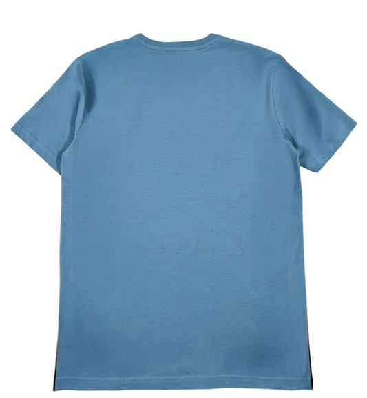 The Iceberg F021-6301-6373 T-Shirt Celeste is displayed flat, highlighting its minimalist design. Embroidered on the back, this ICEBERG blue T-shirt is crafted from 100% cotton, combining simplicity with comfort.