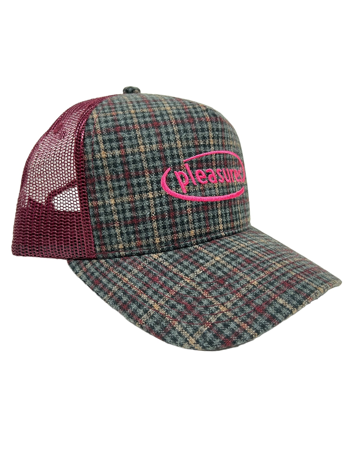 The PLEASURES HAPPIER PLAID TRUCKER MAROON hat by PLEASURES features a pink "Pleasures" logo on the front and a durable burgundy mesh back made from a polyester and nylon blend.