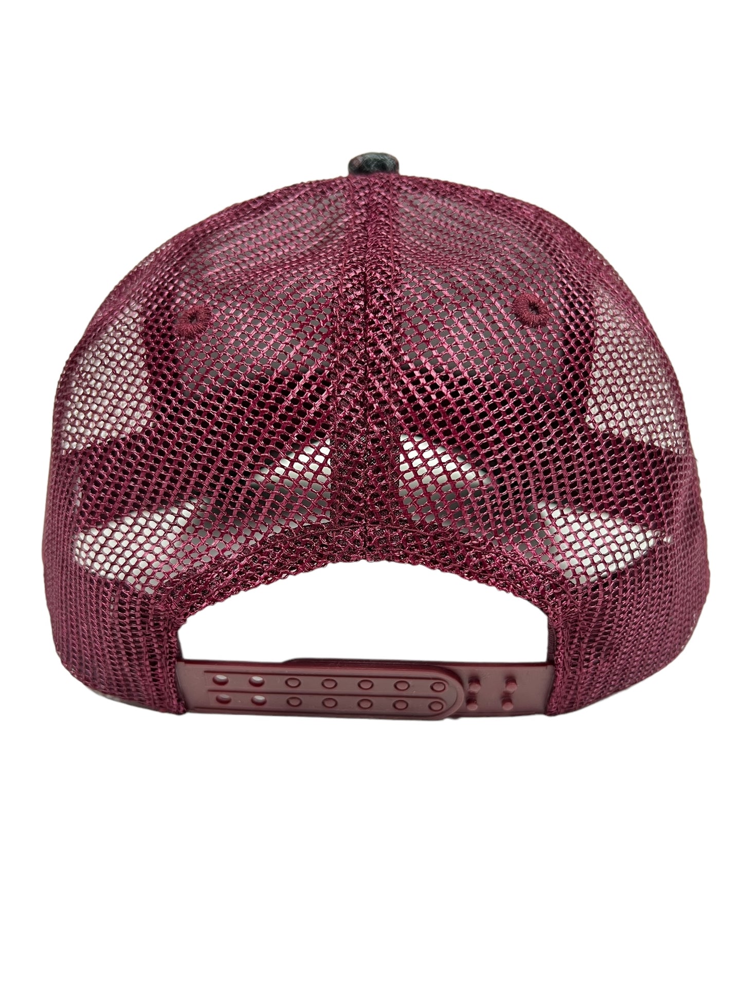 The PLEASURES HAPPIER PLAID TRUCKER MAROON is a maroon trucker hat from PLEASURES, featuring an adjustable snapback closure and a durable polyester and nylon mesh back.