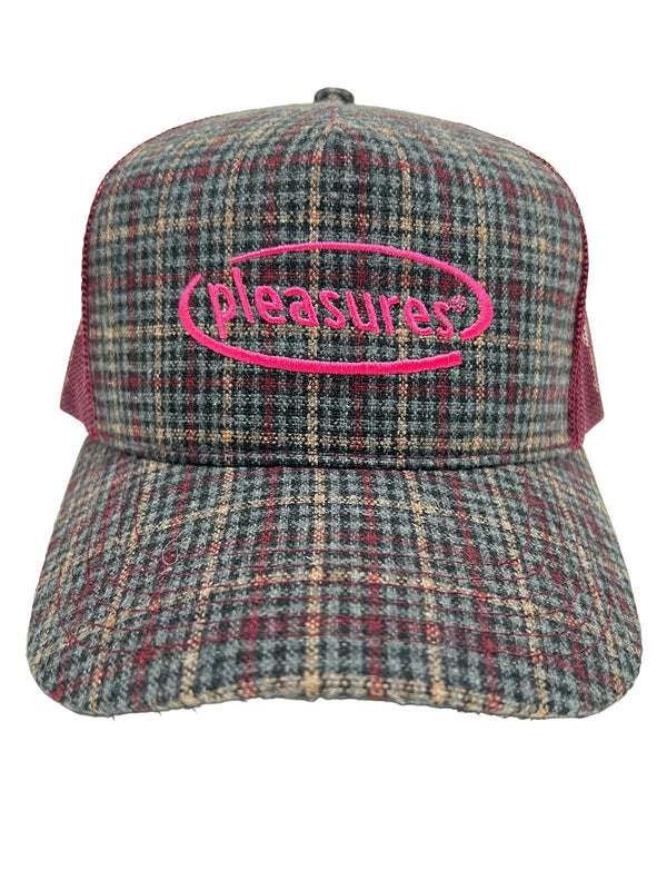 The PLEASURES HAPPIER PLAID TRUCKER MAROON hat is a plaid-patterned trucker cap featuring a pink embroidered "pleasures" logo on the front, crafted from a durable blend of Nylon and Polyester.