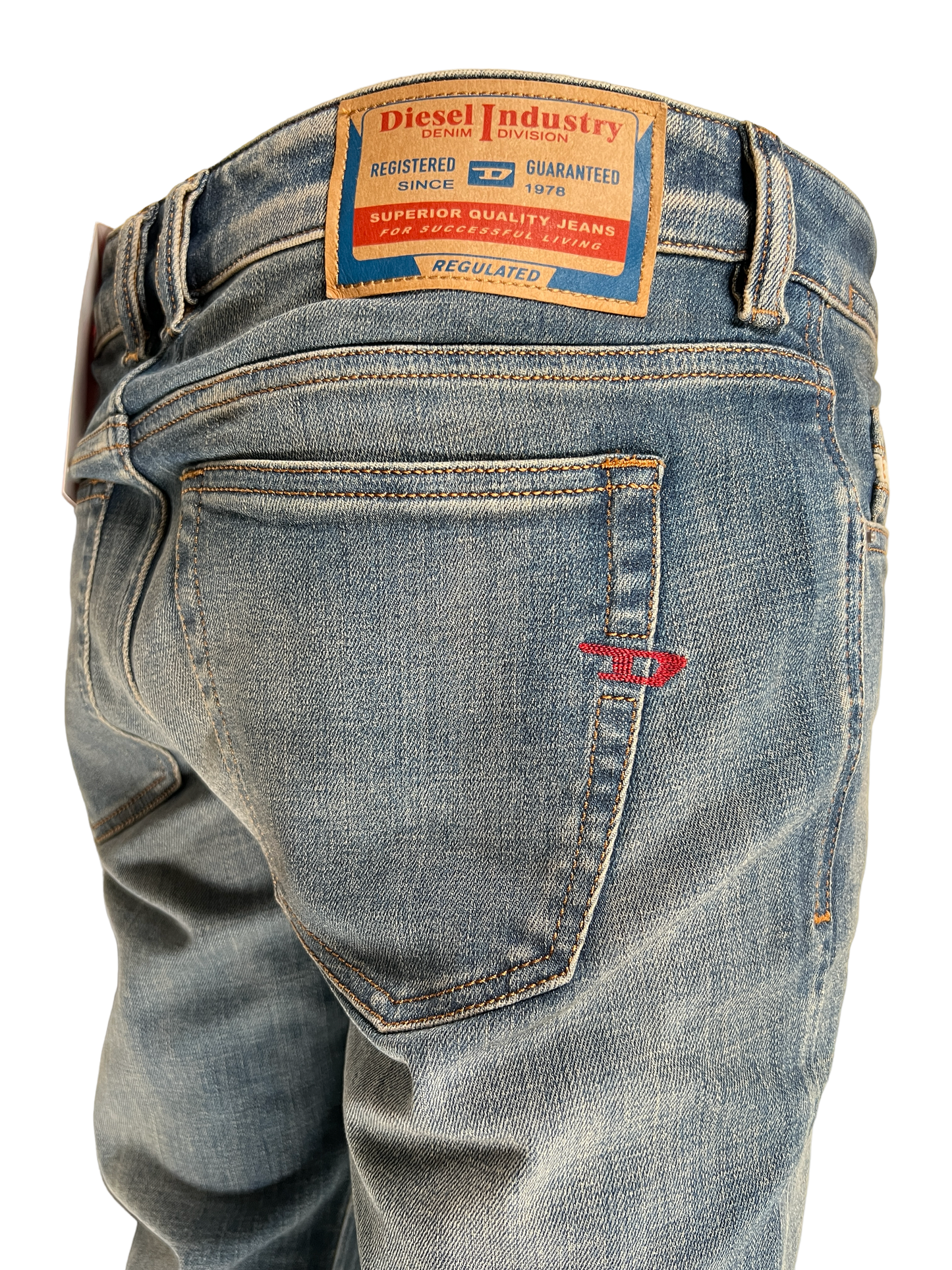 The back pocket of a pair of DIESEL slim fit jeans.