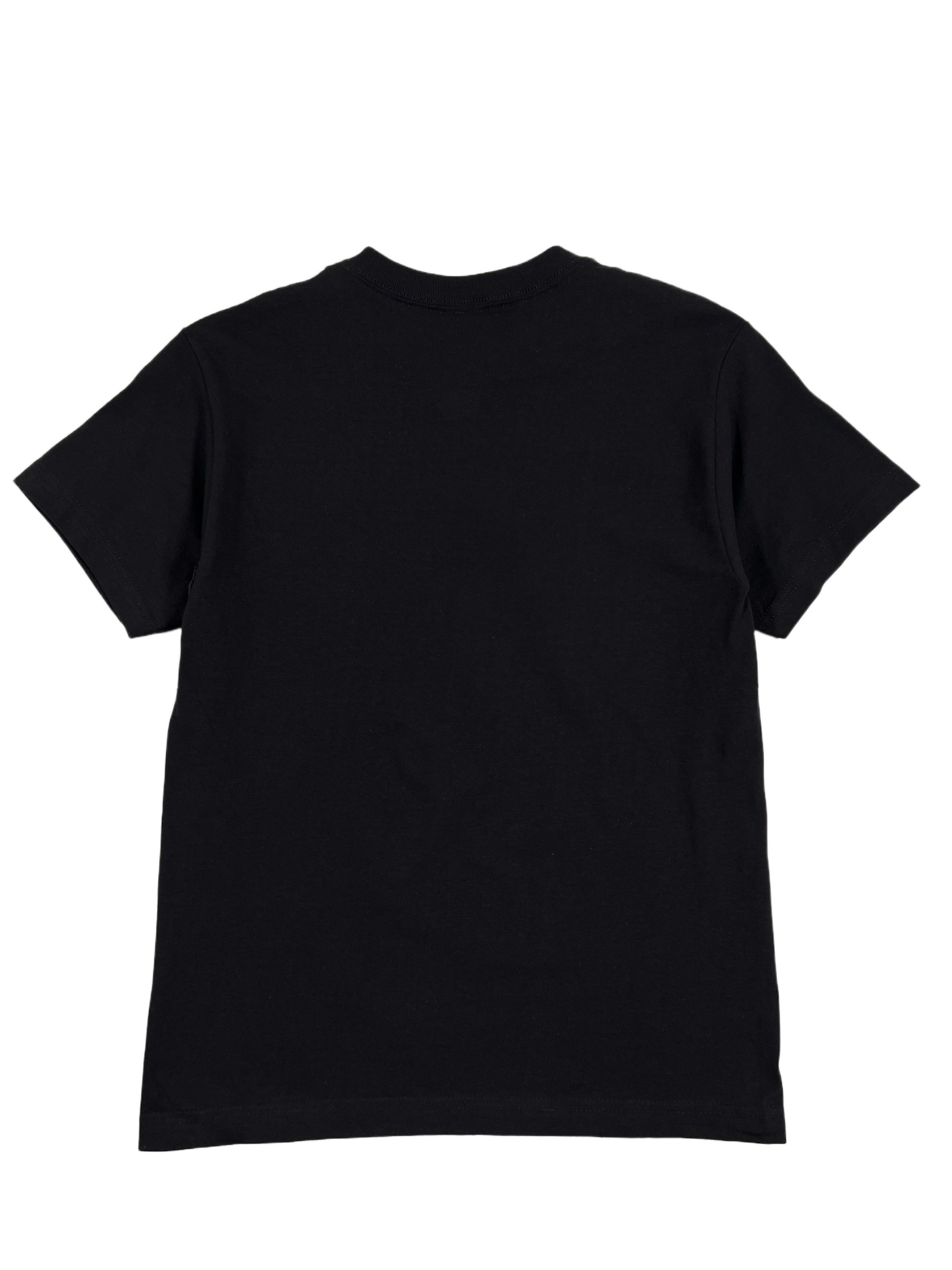The Pleasures Supper T-Shirt in Black/Black by PLEASURES, made from 100% cotton, is elegantly shown from the back against a white background.