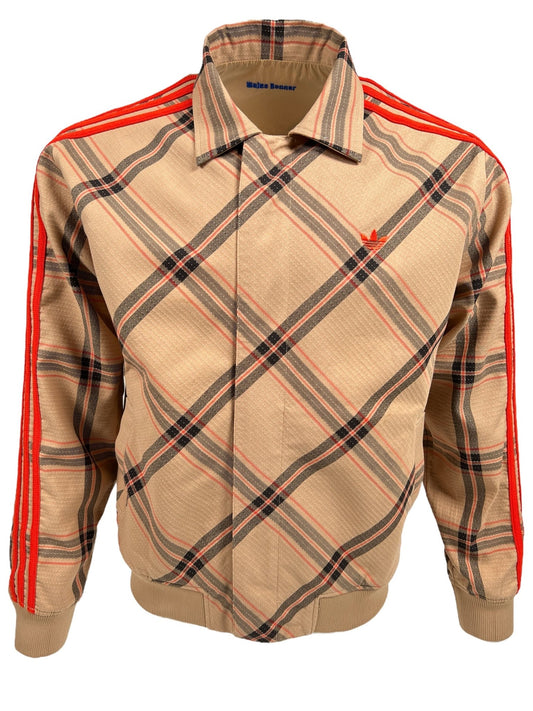 A beige tartan jacket with red and black stripes, featuring a two-way zip fastening, a collar, and the ADIDAS x WALES BONNER logo on the chest.