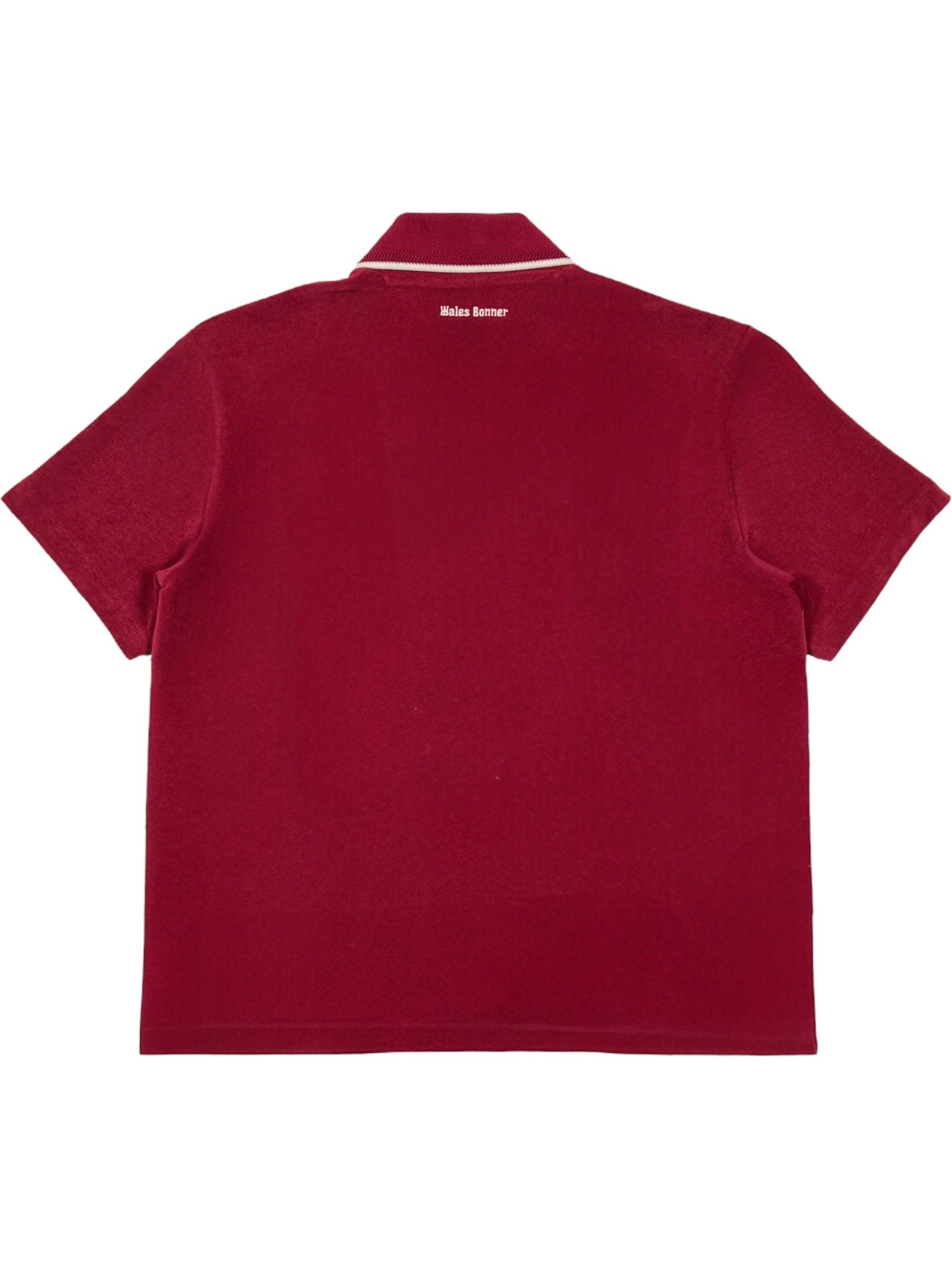 The Adidas x Wales Bonner JW1122 WB Terry Polo Cburg is shown from the back, featuring "Malo Sema" in small white text below the collar, reflecting sporty elegance from the ADIDAS x WALES BONNER collaboration.