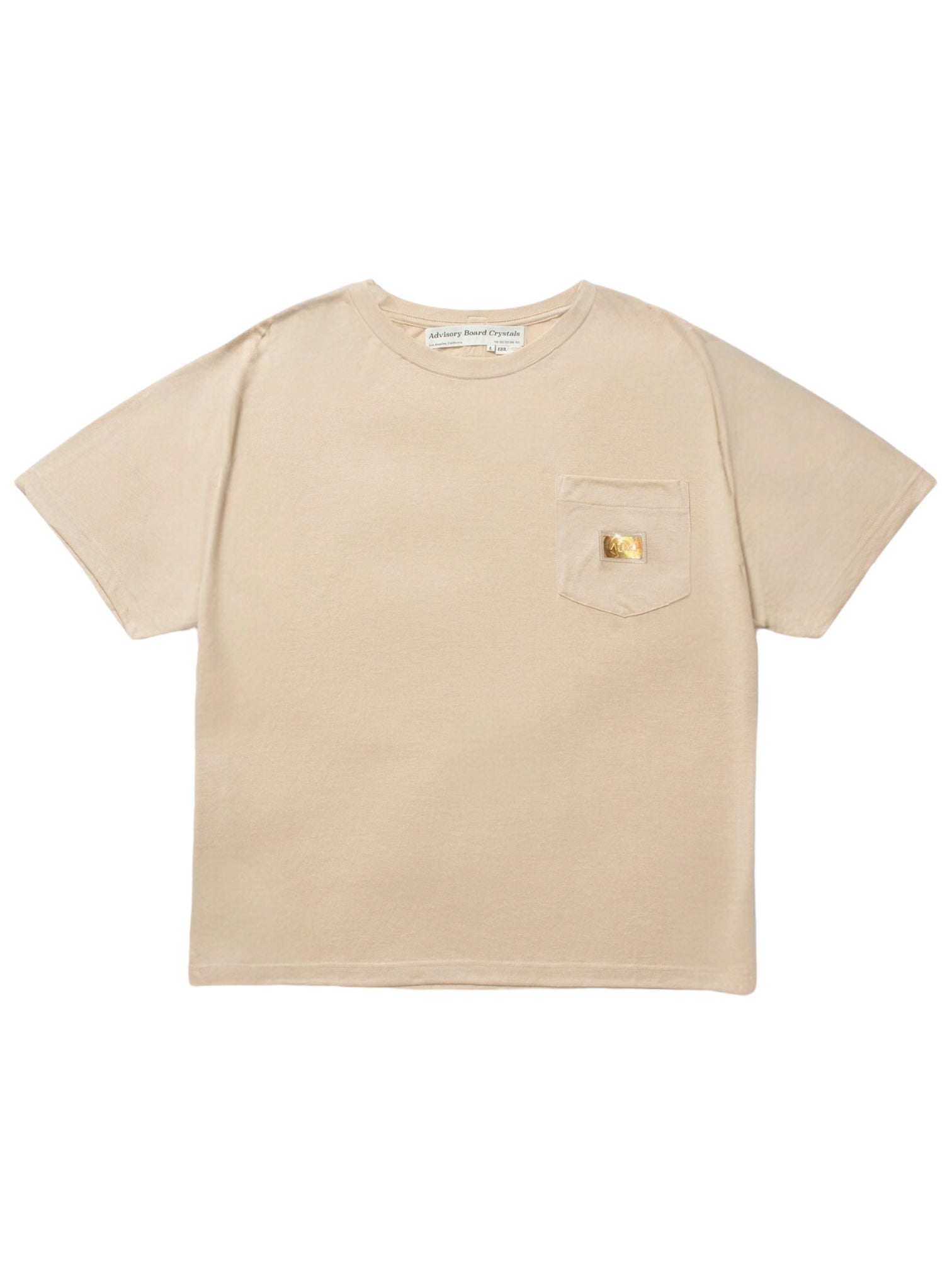 The Advisory Board Crystals S/S Pocket Tee Feldspar Ecru by ADVISORY BOARD CRYSTALS is a beige T-shirt made from a soft cotton blend, featuring a front chest pocket with a small embroidered detail.