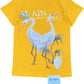 The Al Ain AMHX S120 Jabalia Ocre Yellow t-shirt features two white cranes with green plants and a white jug on the back, "AL AIN" in bold white text above, embroidered branding, and a blue "Al Ain" tag below.