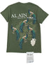 The Al Ain AMHX S121 Peacock Militaire graphic t-shirt by AL AIN features bold “AL AIN” text, white script, six peacocks on branches above a white vase, a matching bottom tag, and an embroidered accent.