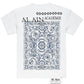 The AL AIN Al Ain AMHX-S817 Sekaya T-shirt White is made in Italy from 100% cotton, featuring a blue ornate floral and geometric design with "AL AIN ACADÉMIE" above it and a small printed tag at the bottom.