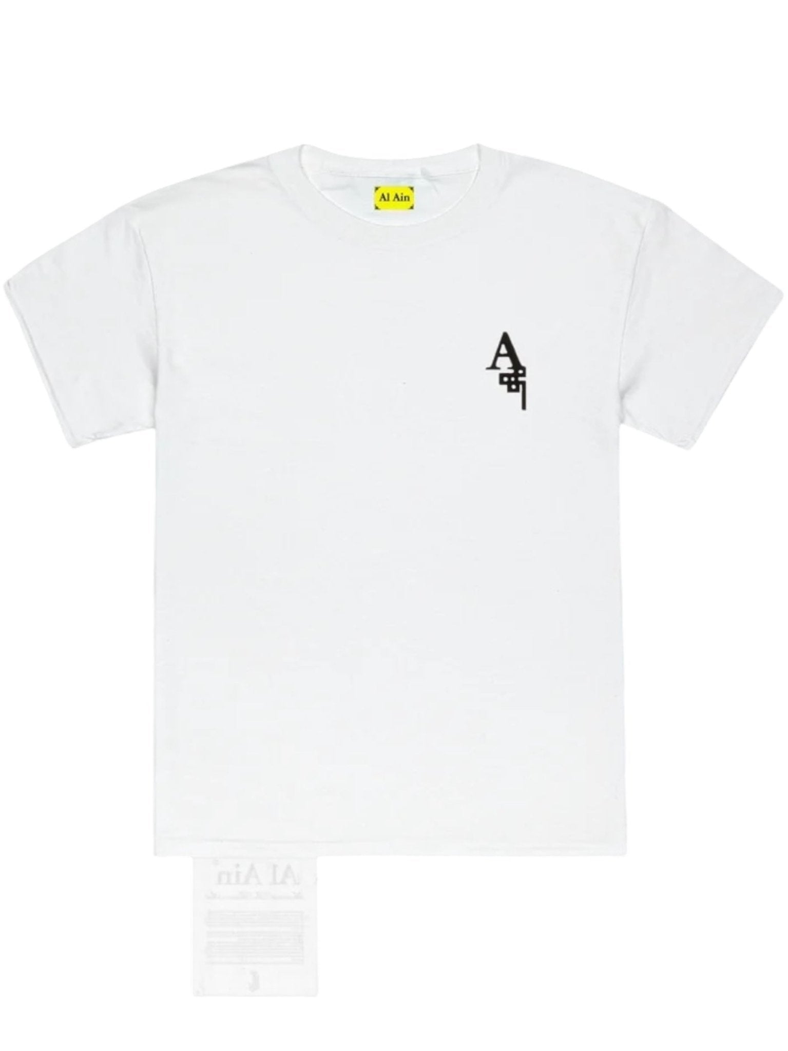 The AL AIN Al Ain AMHX-S817 Sekaya T-shirt White is a 100% cotton short-sleeve tee, featuring a black geometric chest design, yellow "Ai Aiin" collar label, Made in Italy, with a clear plastic bag at the bottom left.