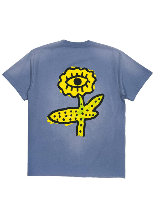 ALCHEMIST ALL-SEEING CACTUS TEE in Breeze Blue, featuring a vintage washed finish and a yellow flower with an eye in the center on the back.