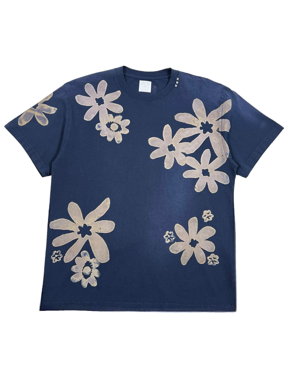 ALCHEMIST BLOCK PRINT S/S TEE NIGHTFALL BLUE by ALCHEMIST, featuring a vintage washed finish with large, light-colored floral print design scattered on the front and sleeves.