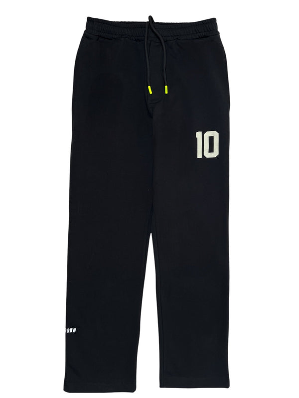 The Barrow S5BWUAFP025 Sweatpants in black are crafted from 100% cotton, featuring a drawstring, the number 10 on the upper left thigh, and small text near the ankle. Made in Italy by BARROW, they combine comfort and style.