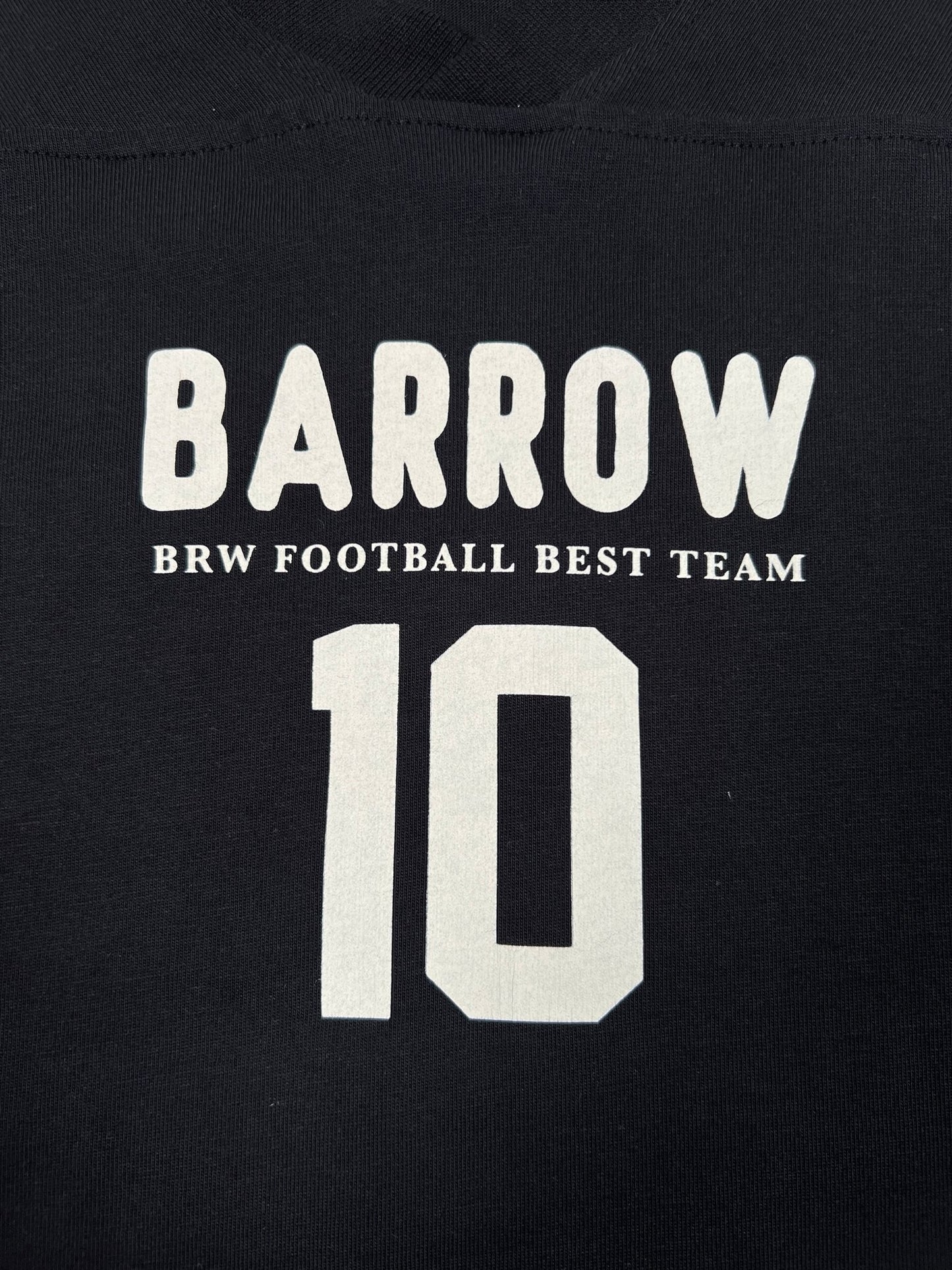 The Barrow S5BWUATH022 Jersey T-shirt in black from BARROW features bold white "BARROW" and "BRW FOOTBALL BEST TEAM" text above the number "10".