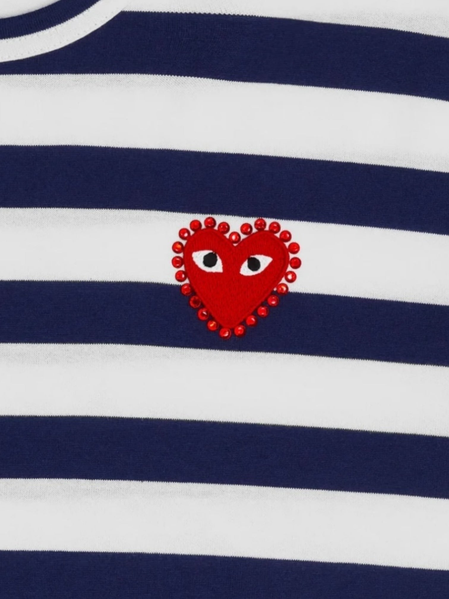The COMME DES GARCONS X PLAY P1T805 T-Shirt in navy/white features signature rhinestone heart detailing.