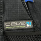 Close-up of DEVA'STATES Deva'States Hike Cargo Shorts in washed black, featuring a branded patch, adjustable webbing belt, and blue cord detail above the mesh pocket.