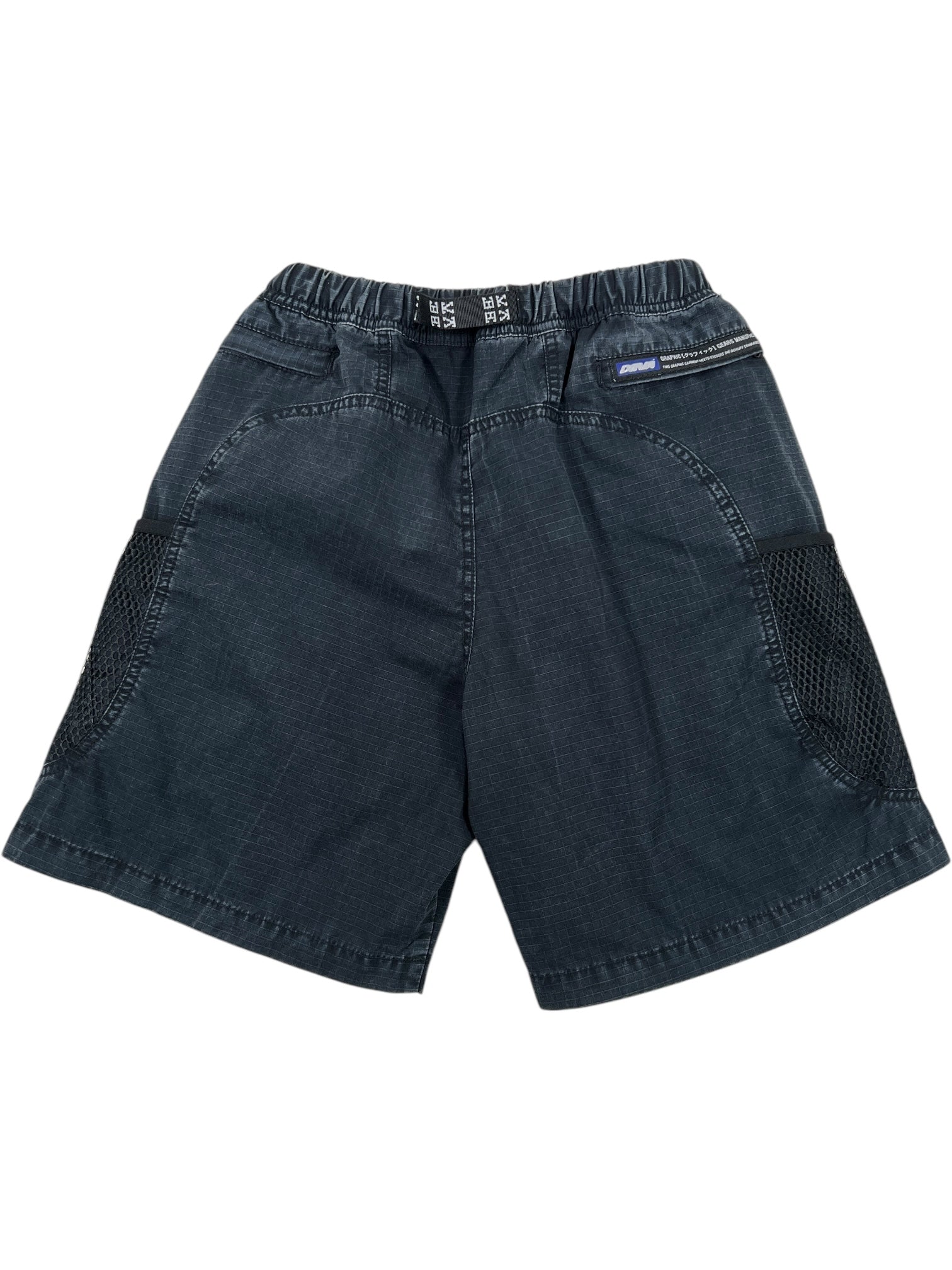 DEVA'STATES Deva'States Hike Cargo Shorts Washed Black feature an elastic waistband, front pockets, mesh side panels, a zippered right pocket, and a vintage washed look for stylish comfort.