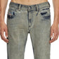 A shirtless individual wearing DIESEL's 1979 SLEENKER 68ND light blue stretch-denim distressed skinny jeans, with hands resting at their sides.