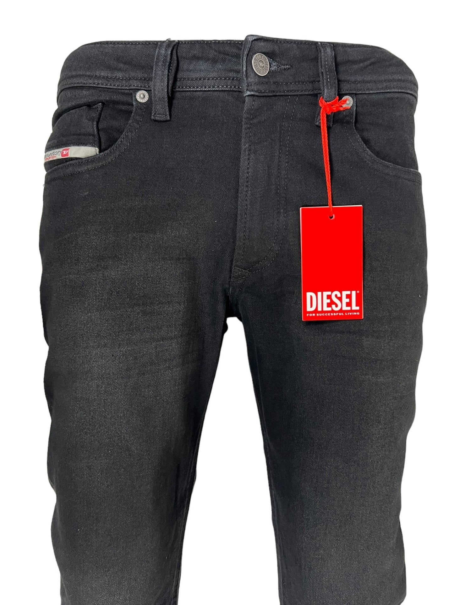 A pair of DIESEL 1979 SLEENKER 9H94 DENIM BLACK featuring a red tag attached to the front belt loop, crafted from stretch denim for a comfortable fit.