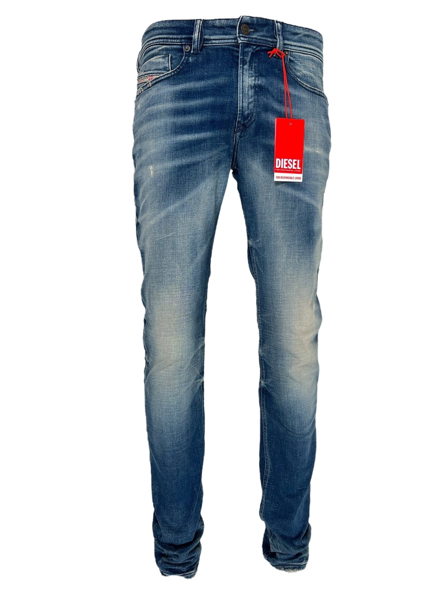 A pair of DIESEL 1979 SLEENKER 9J24 medium blue stretch denim jeans with a red "Diesel" tag attached to the belt loop, shown facing forward. Crafted from organic cotton, these jeans feature a slightly faded texture and embody a punk-rock attitude with their straight-leg fit.