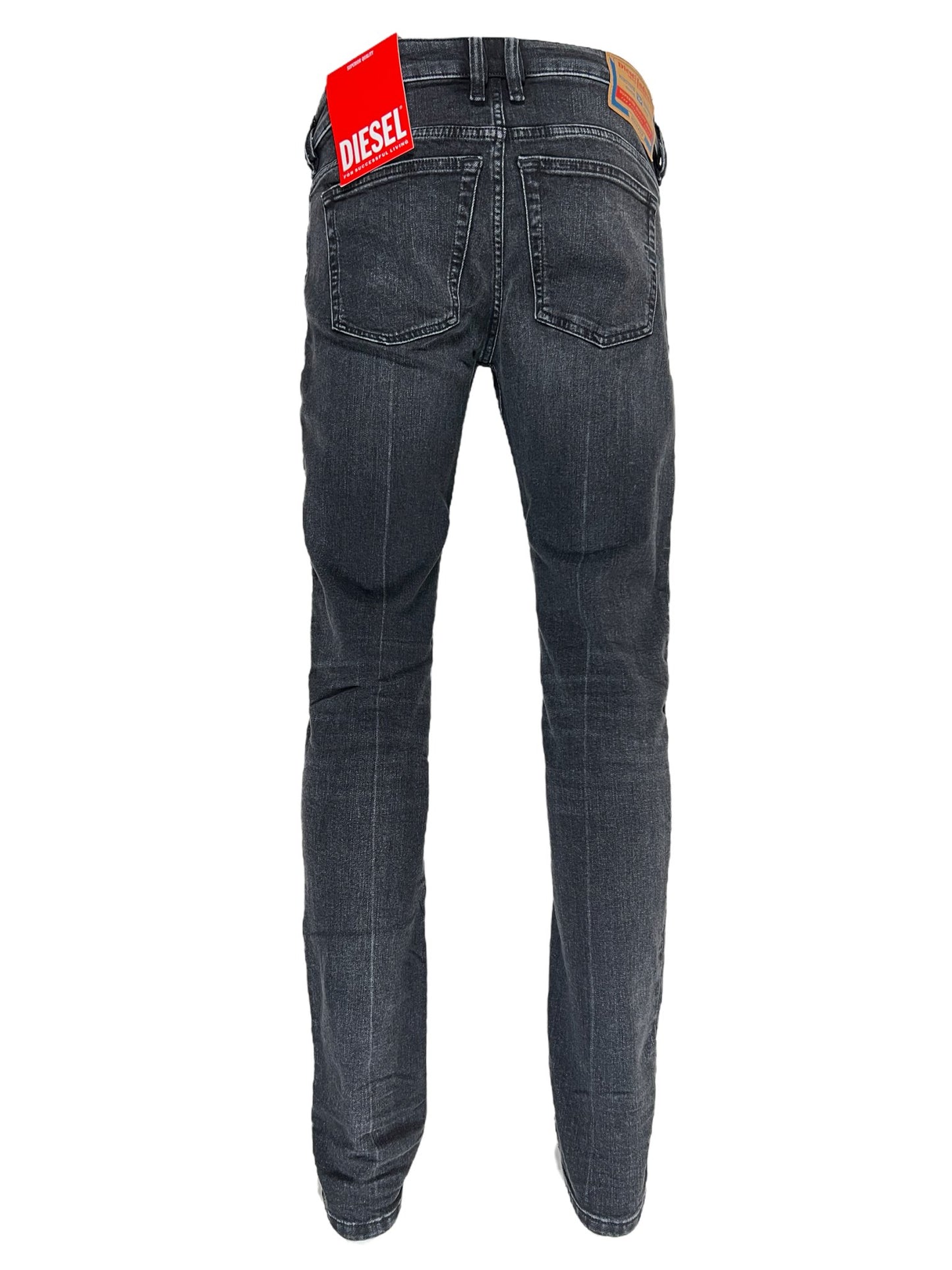 Sentence with replaced product name: Dark-wash DIESEL 1979 SLEENKER PFAX skinny jeans with a logo patch on the back waistband.