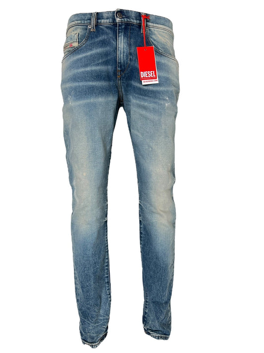 A pair of slim, faded blue DIESEL 2019 D-STRUKT 07V8 jeans featuring a red Diesel brand tag attached, photographed from the front.