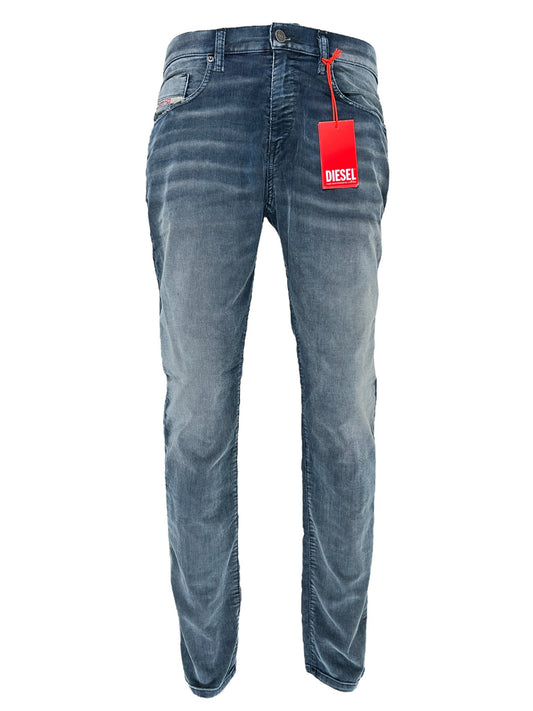 A pair of DIESEL brand slim jeans for men with a red tag displayed on a white background.
