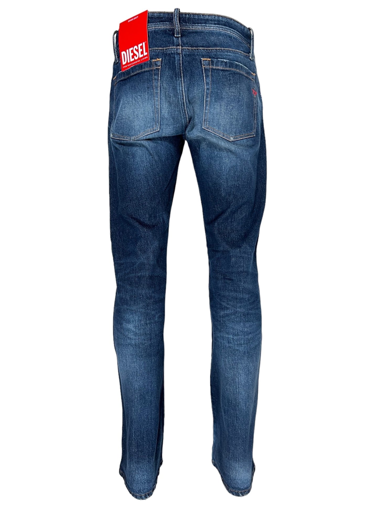 Rear view of a pair of blue Diesel D-Backler 9J56 bootcut jeans, highlighting visible pockets and featuring a red DIESEL tag on the waist, embodying the classic Diesel DNA.