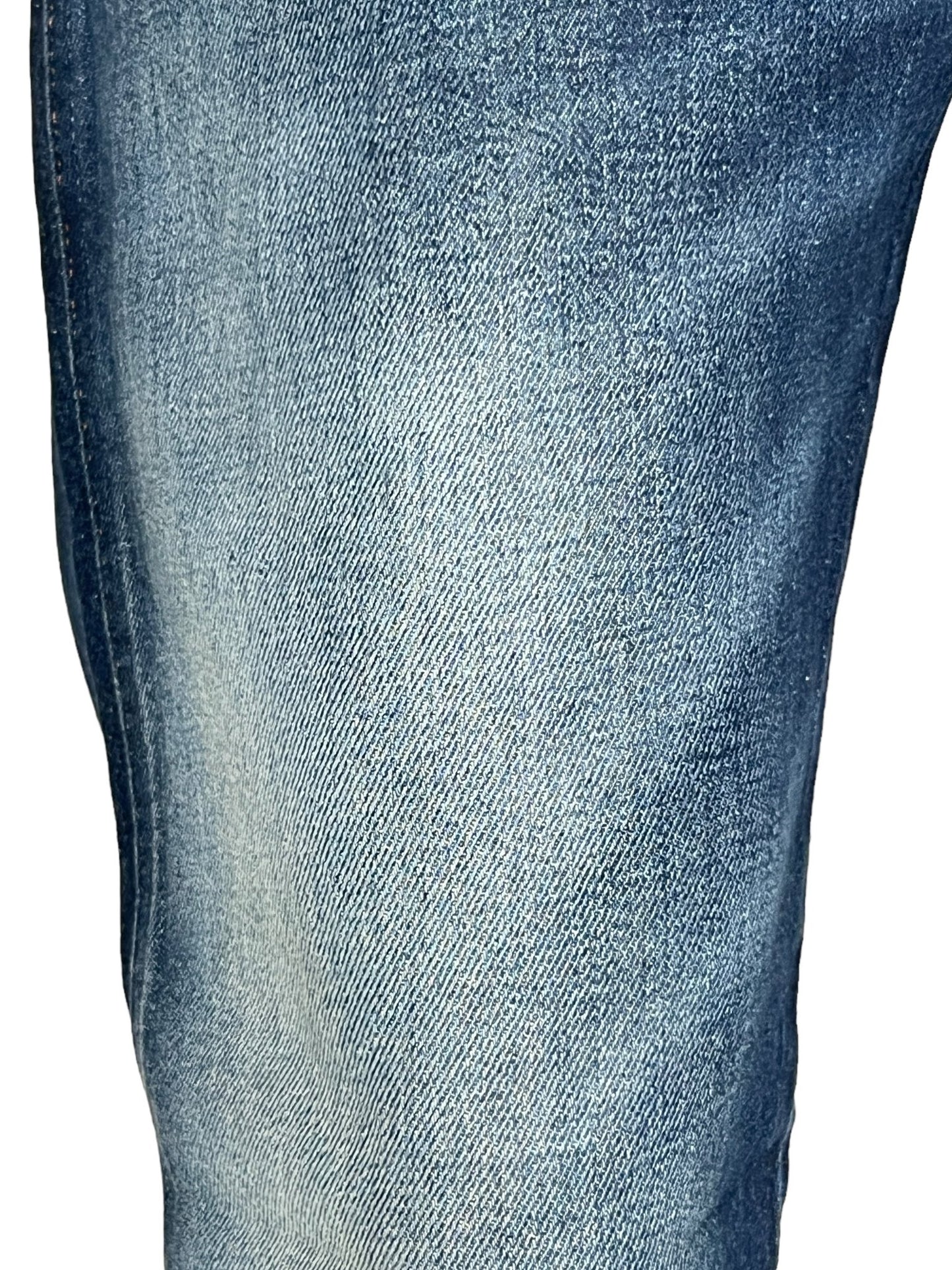 Close-up of Diesel D-Backler 9J56 jeans highlighting the blue denim texture and stitching that embodies DIESEL DNA.