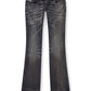 A pair of low waist, dark-wash DIESEL D-BACKLER-RR 9J65 jeans with a slim fit and subtle fading and whiskering details, lying flat on a white background.