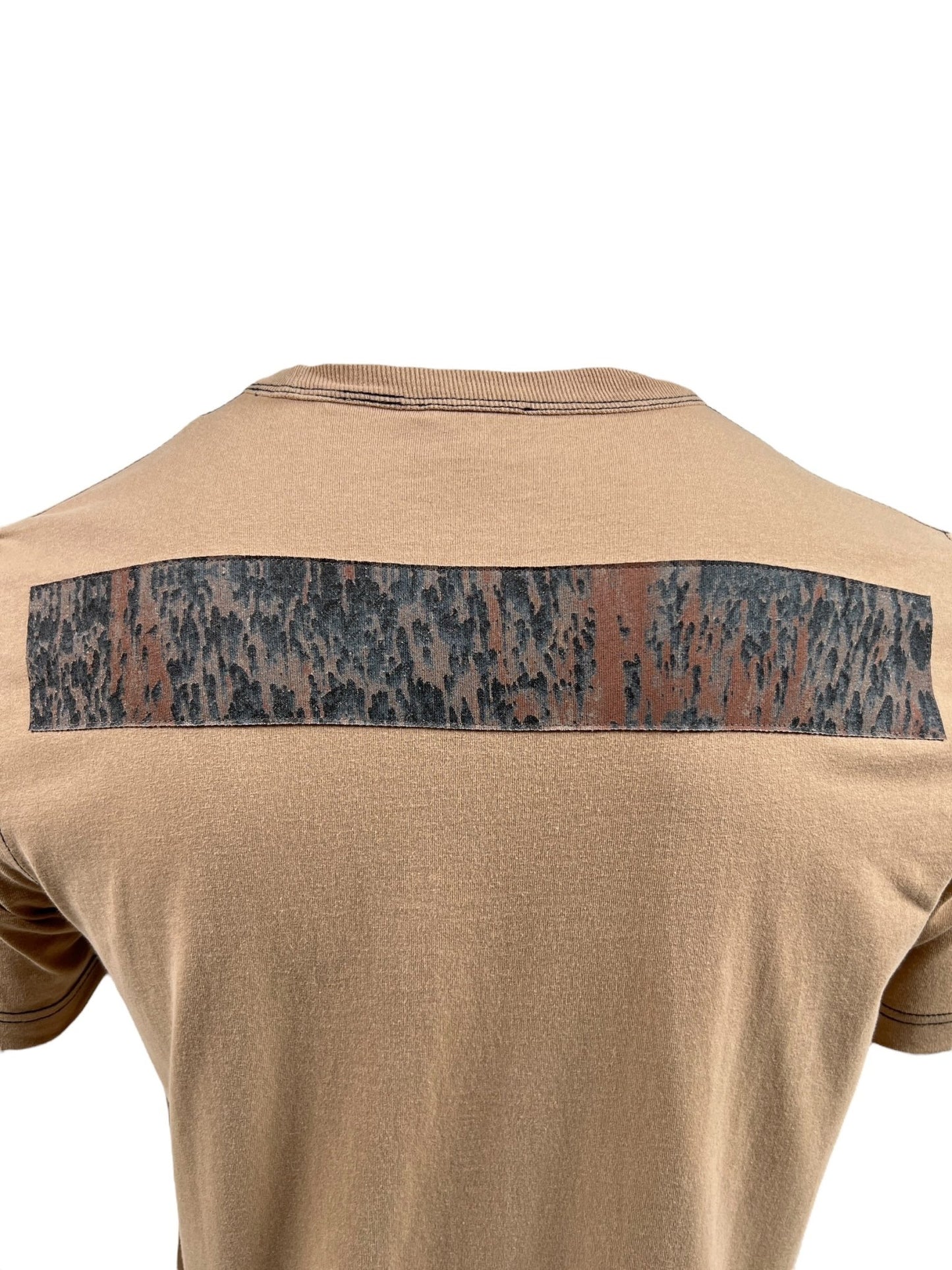 Back view of the DIESEL T-ADJUST-Q1 T-SHIRT 72S, a men's cotton T-shirt in tan, featuring a black and brown textured horizontal stripe with an acid rain effect across the upper back.