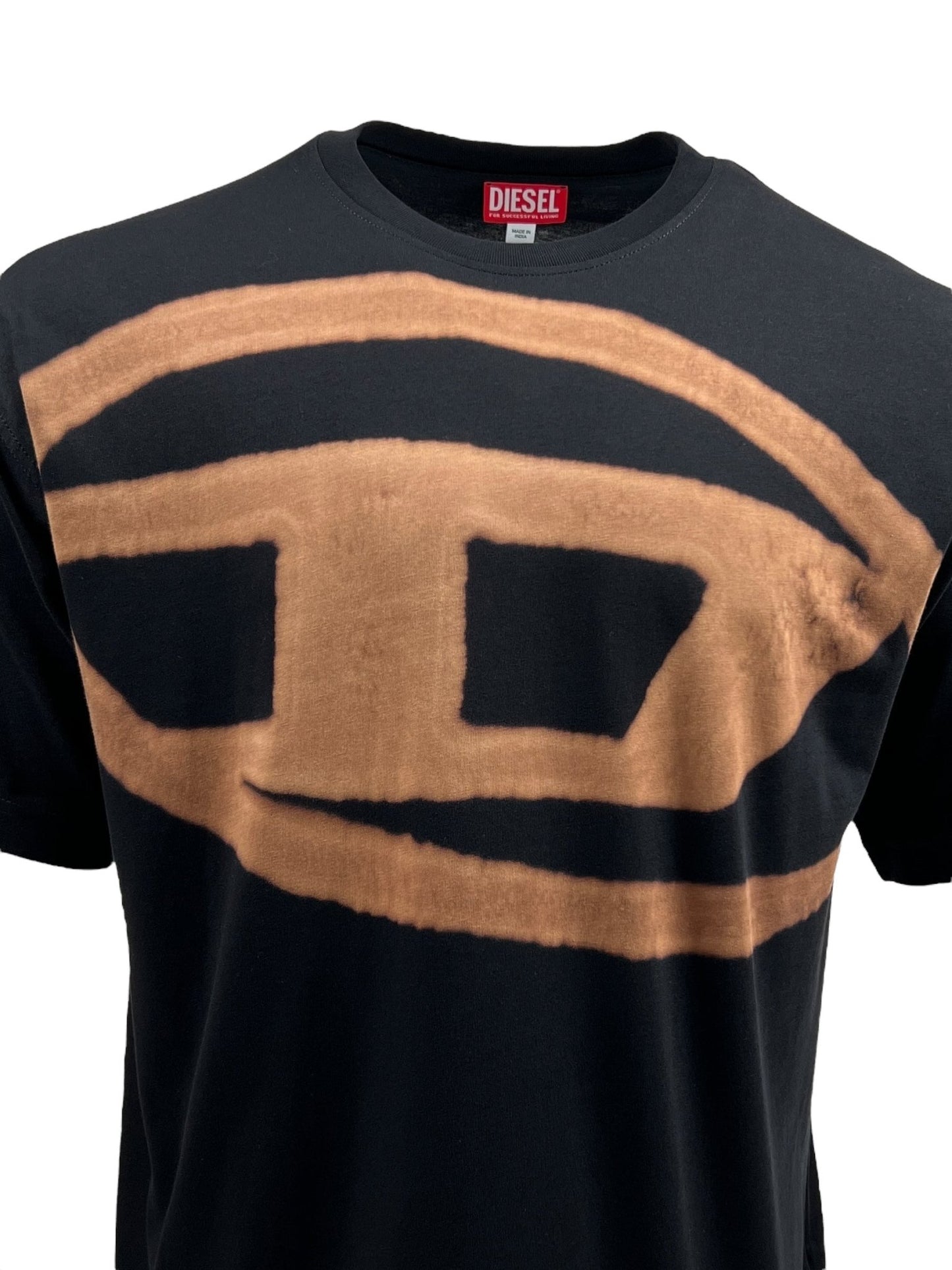 Men's black DIESEL T-BOXT-BLEACH T-SHIRT made from organic cotton, featuring a large tan abstract design on the front and a red Diesel Oval D logo label on the neck.