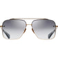 The DITA Mach Six DTS121-62-01 sunglasses feature gold metal aviator frames and gradient gray lenses, shown front-facing on a white background, showcasing DITA’s racing-inspired eyewear style.