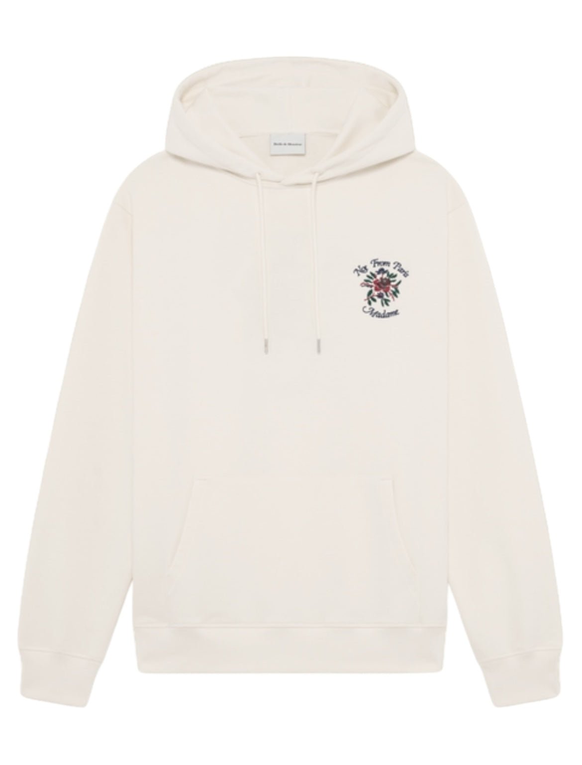 The DROLE DE MONSIEUR E-HO169-CO127-CM LE HOODIE FLEURS CREAM is a white French terry hoodie featuring a front pouch pocket and drawstrings, adorned with small floral Crillon embroidery and text on the left chest area. Made from 100% cotton to ensure maximum comfort.