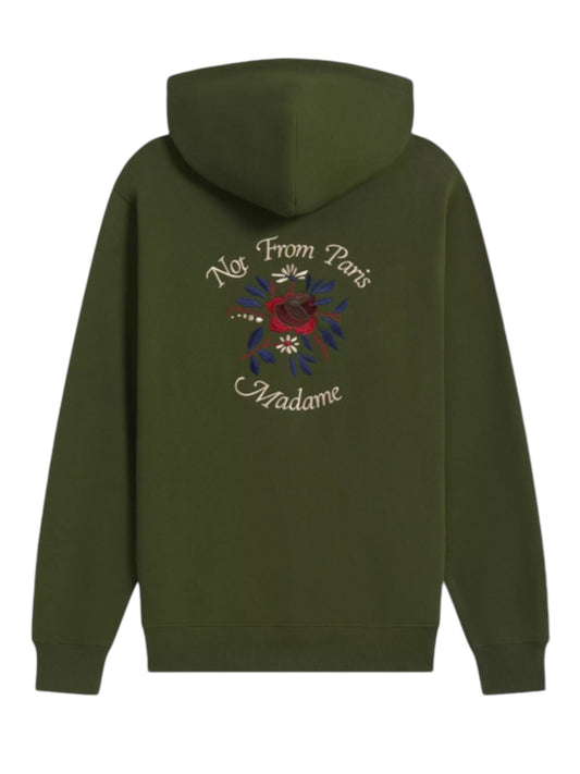 DROLE DE MONSIEUR E-HO169-CO127-KK LE HOODIE FLEURS KAKI features a text "Not From Paris Madame" and a fleurs embroidery slogan adorning the back.