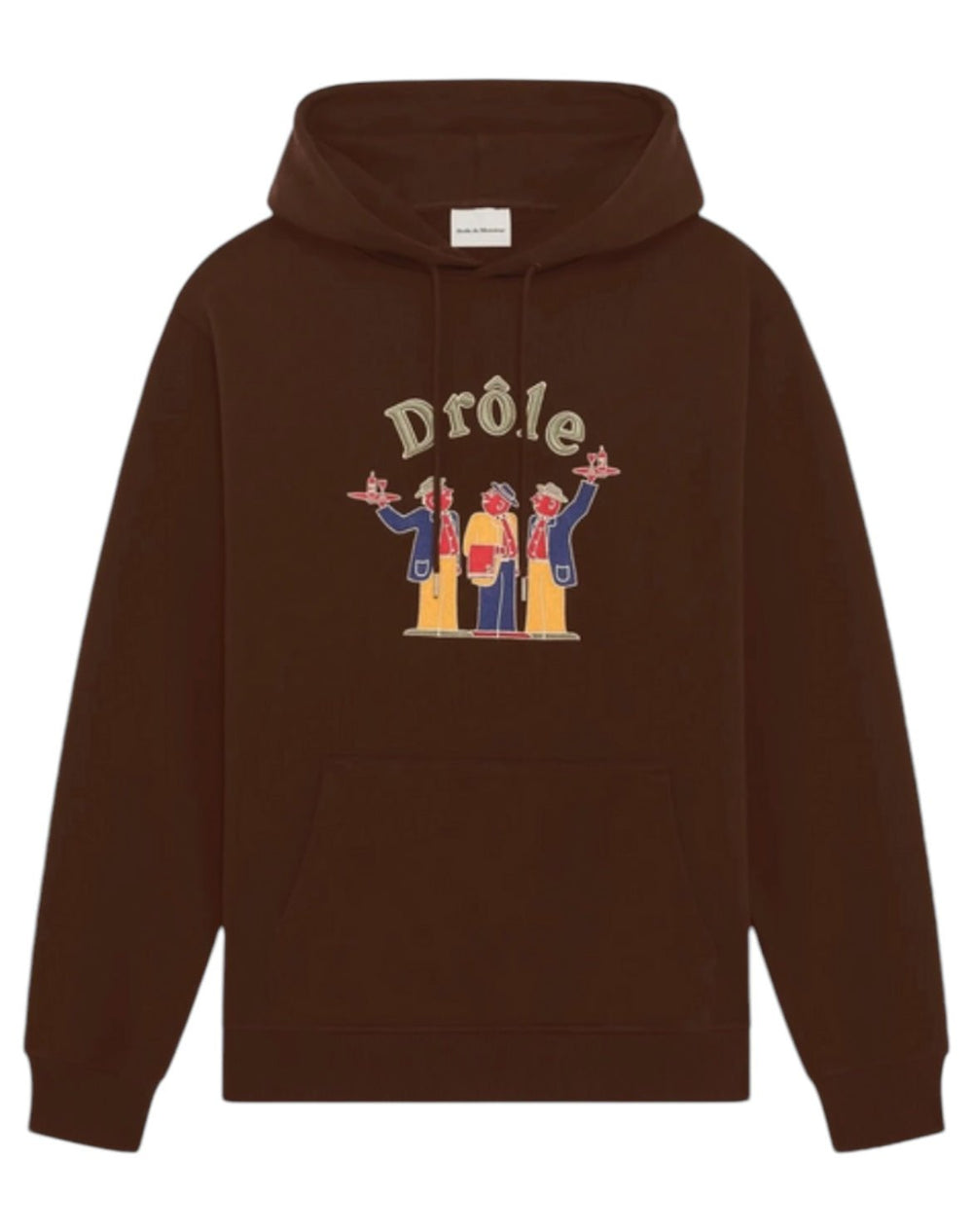 The DROLE DE MONSIEUR E-HO172-CO127-DBN LE HOODIE CRILLON BRW is a brown French terry hoodie with a front pocket, featuring an illustrated design of four figures and the word "Drôle" above them, crafted from 100% cotton.