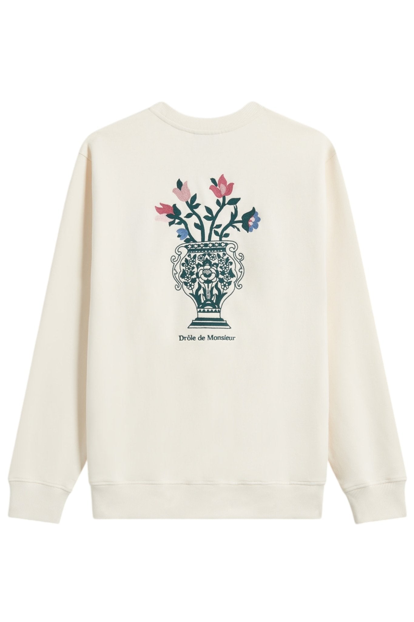 The DROLE DE MONSIEUR E-SW153-CO127-CM LE SWEATSHIRT CREAM is a beige French terry sweatshirt, showcasing an embroidered vase and flowers design on the back with "Drôle de Monsieur" text beneath. Made from 100% cotton, it ensures ultimate comfort and style.