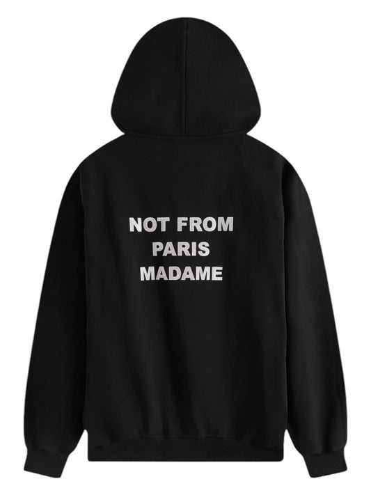 The Drôle de Monsieur PERM-HO162-CO127-BL LE Hoodie Black is made from 100% French terry cotton and features the bold "NOT FROM PARIS MADAME" printed in white on the back.