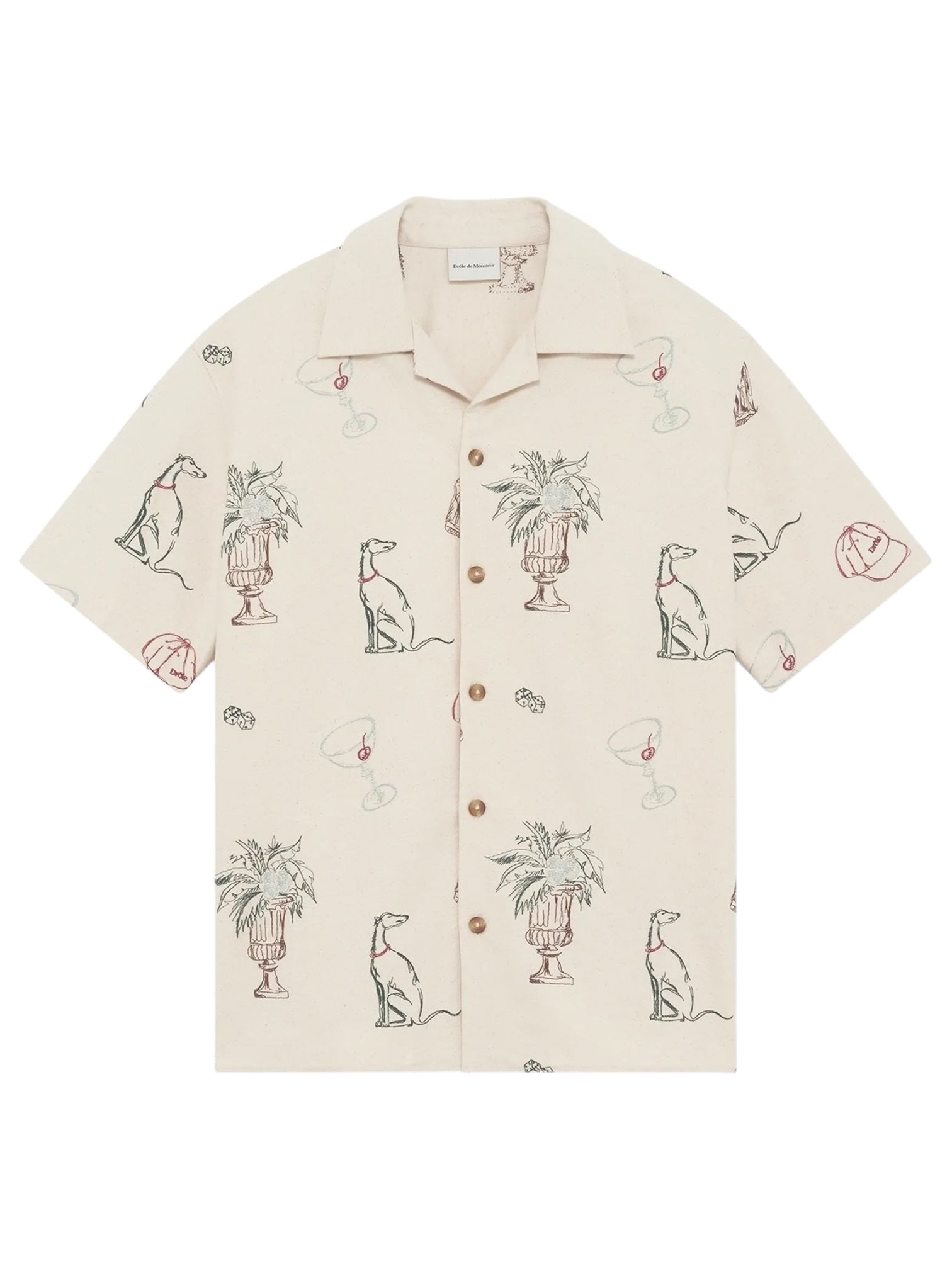 The Drôle de Monsieur SH214-CO198-EC La Chemise Brodee Ecru is a beige short-sleeved cotton blend shirt with outlined dogs, potted plants, cocktail glasses, and cherries for a playful yet refined look.