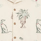 Drôle de Monsieur SH214-CO198-EC La Chemise Brodee Ecru: a cream cotton-blend short-sleeved shirt featuring sketched greyhounds, potted plant, martini glasses with olives, dice, button front, and subtle Country Club embroidery.