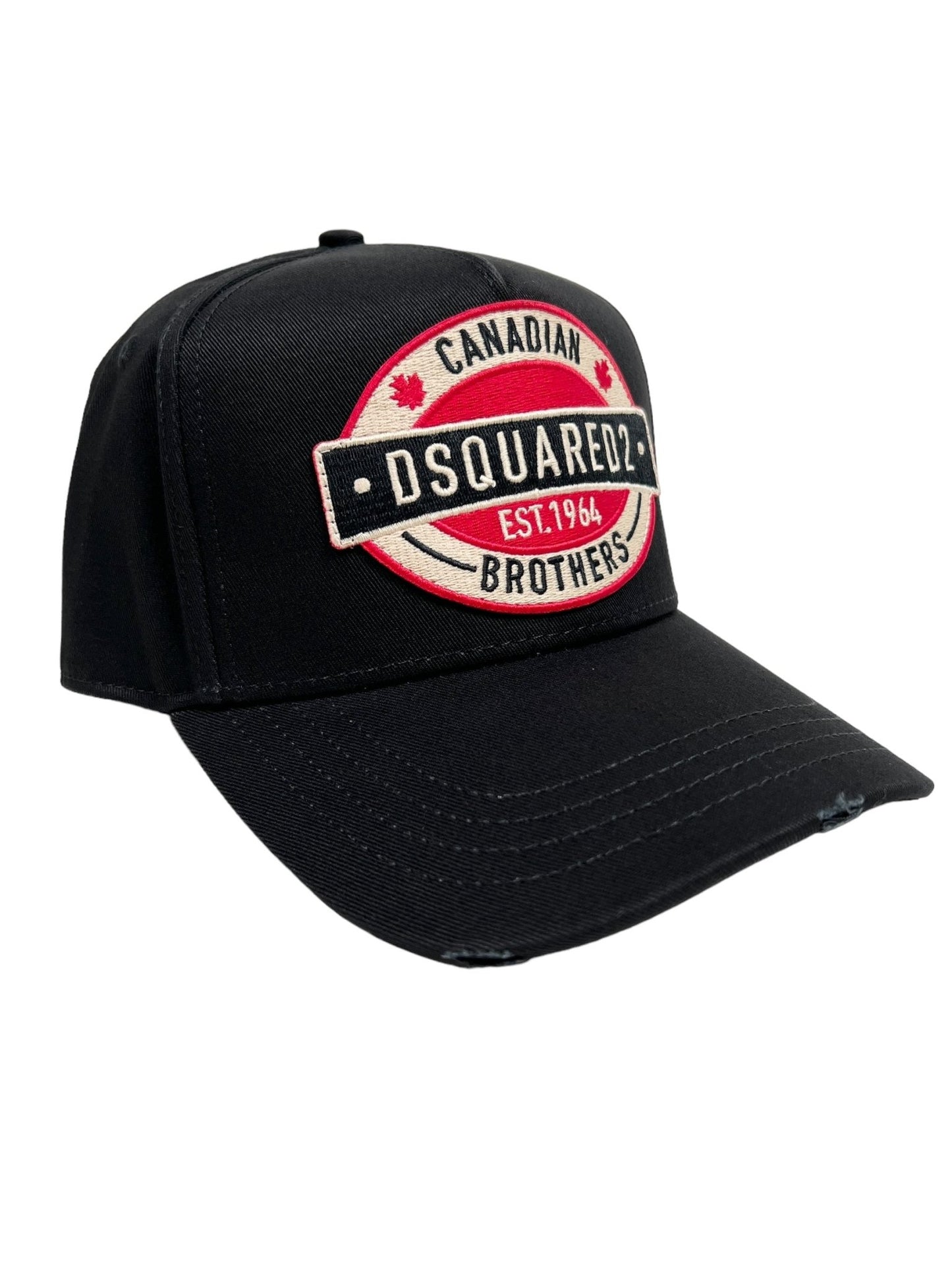 The DSQUARED2 BCM0621 Logo Baseball Cap in color 2124 features a black cotton design with an embroidered logo patch that reads "CANADIAN BROTHERS DSQUARED2 EST.1964" in white and red letters, adorned with two red maple leaf icons. It includes an adjustable strap for a tailored fit.