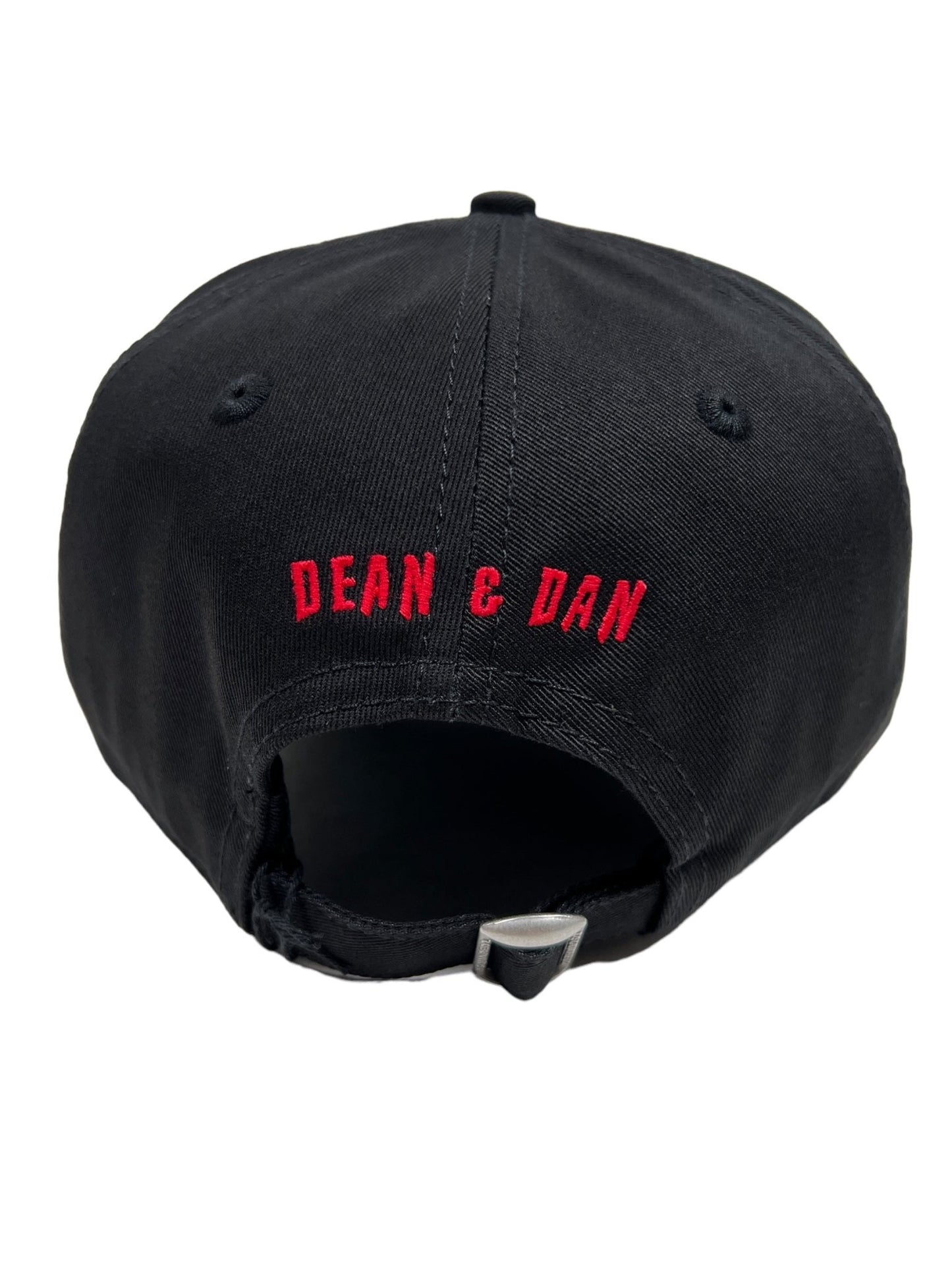 Here's the rewritten sentence incorporating the given product data:

"Back view of a DSQUARED2 BCM0824 HORROR BASEBALL CAP COL.2124, featuring an adjustable strap and 'DEAN & DAN' embroidered in red on the rear. Perfect for sporty looks, this black baseball cap is crafted from 100% cotton for ultimate comfort.