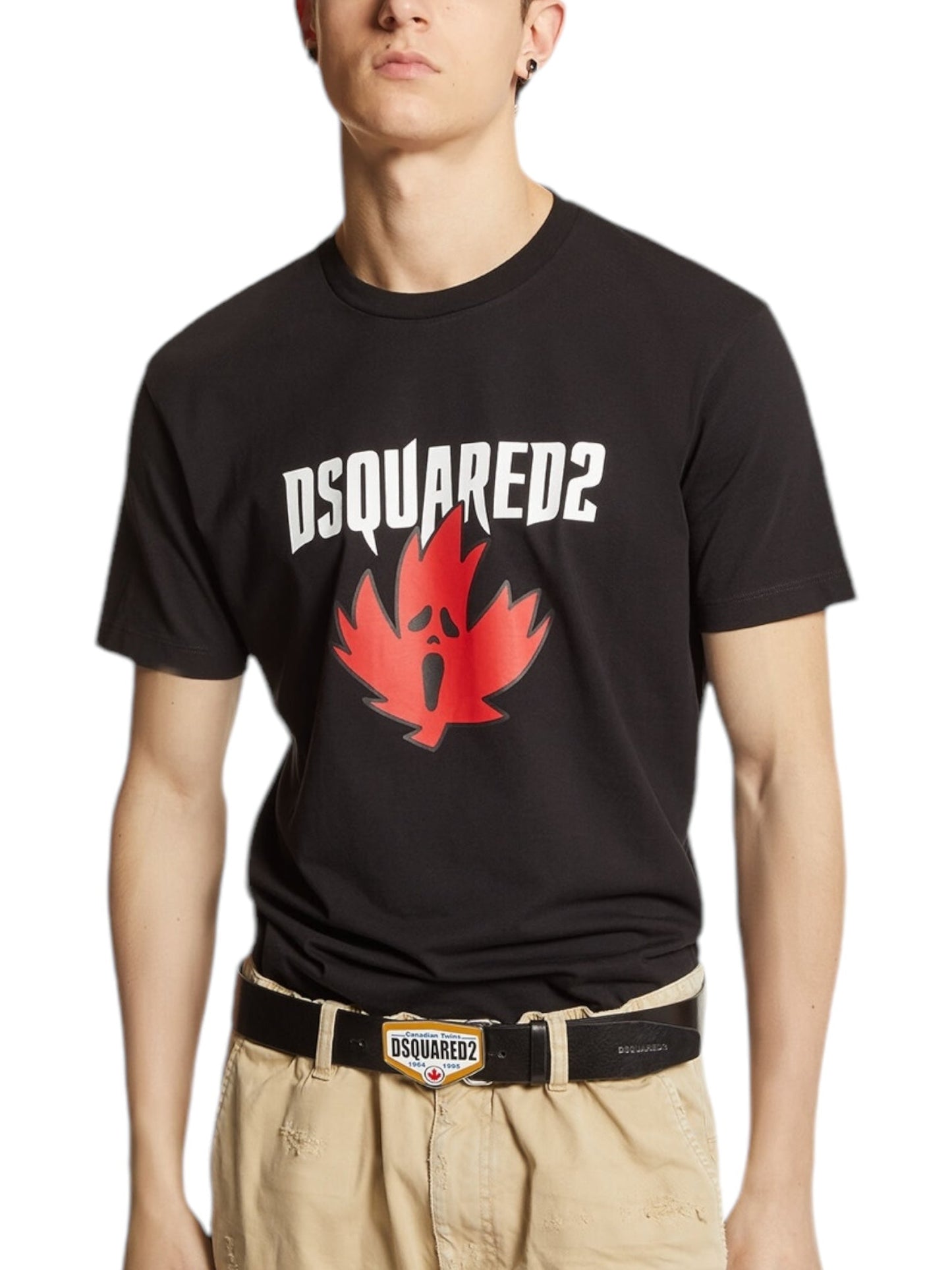 A person wearing a chic Dsquared2 S74Gd1307 Cool Fit Tee Black, styled with a bold red leaf graphic and made from 100% cotton, teamed up with beige pants and finished off with a DSQUARED2 belt.