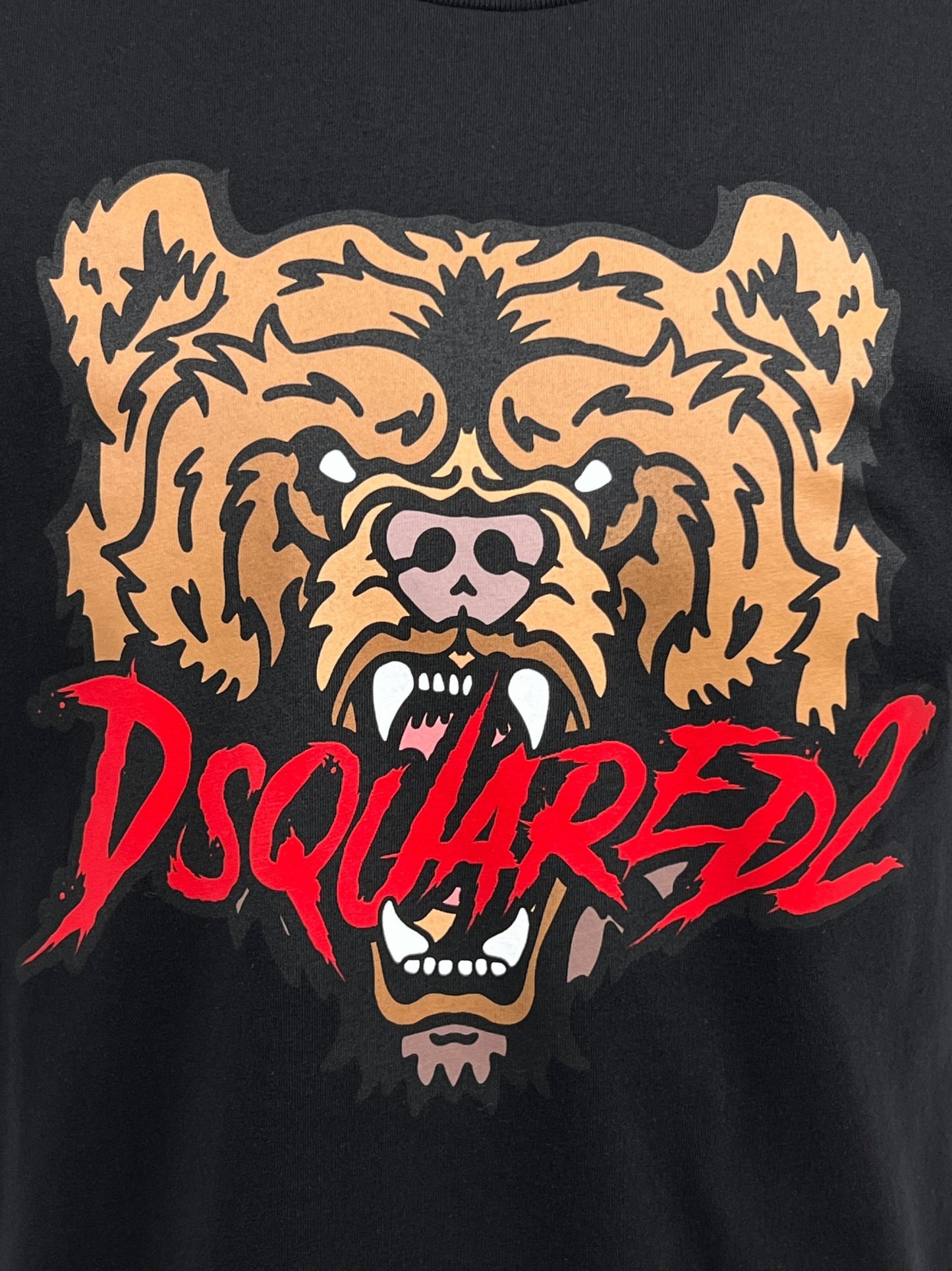 The Dsquared2 S74Gd1316 Regular Fit Tee in black features a bear's face graphic with bold red "DSQUARED2" text on a 100% cotton T-shirt.