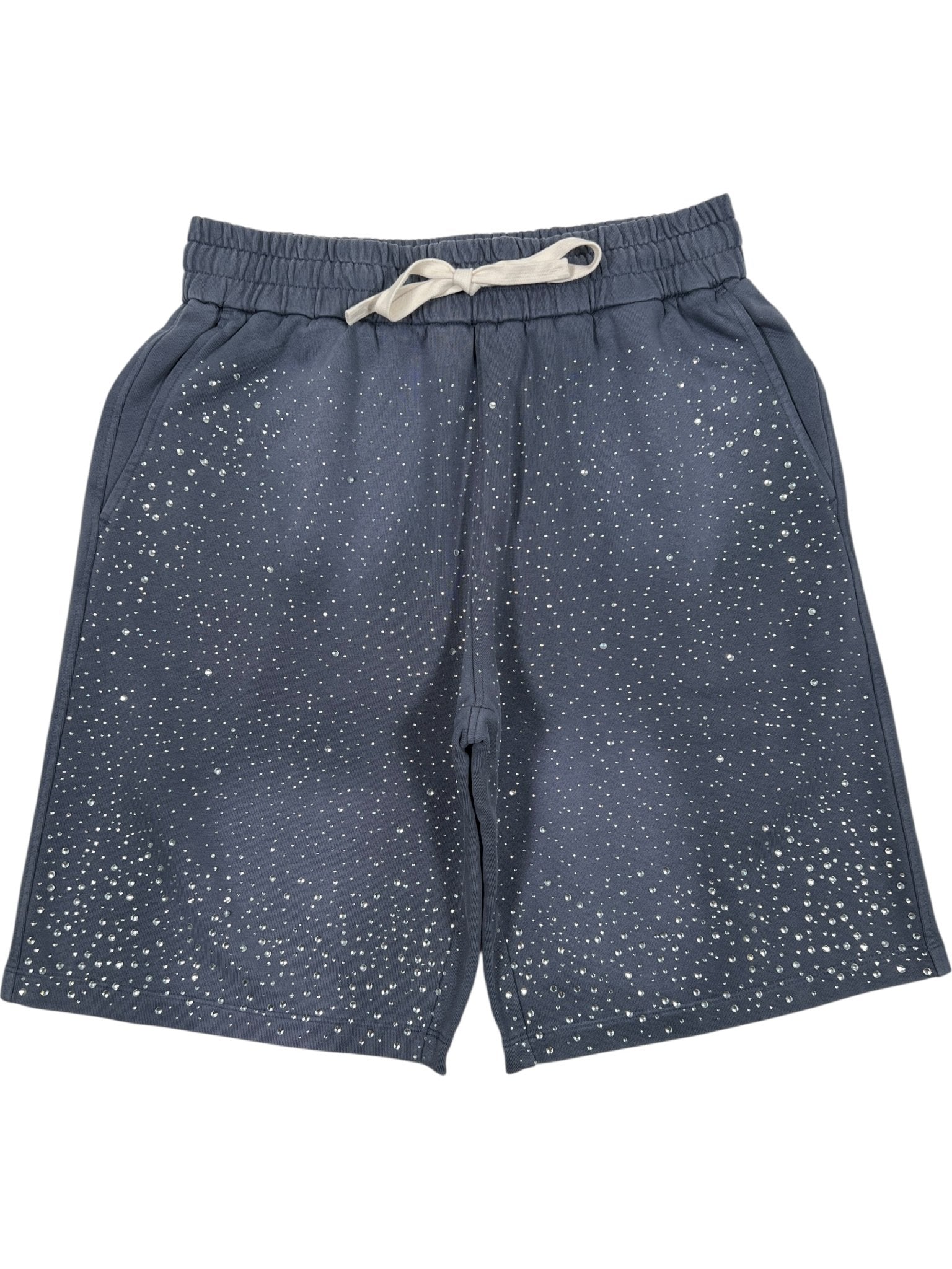 The Duaa "Success" Navy Stone Sweat Short by DUAA features an elastic waistband, white speckled pattern, and is crafted from 100% cotton for comfort.