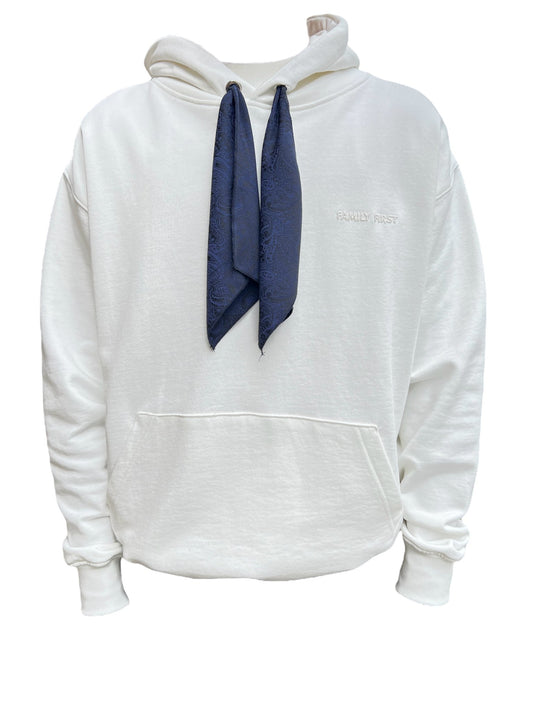 White FAMILY FIRST hoodie with blue necktie draped over the front, made in Italy, featuring a "family first" logo embroidered near the left shoulder.